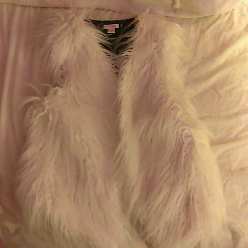 Fluffy white vest